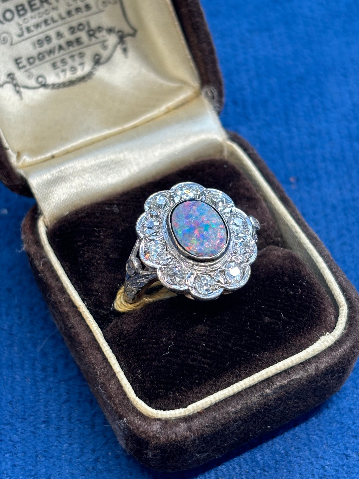 Opal and diamond 18ct and platinum ring