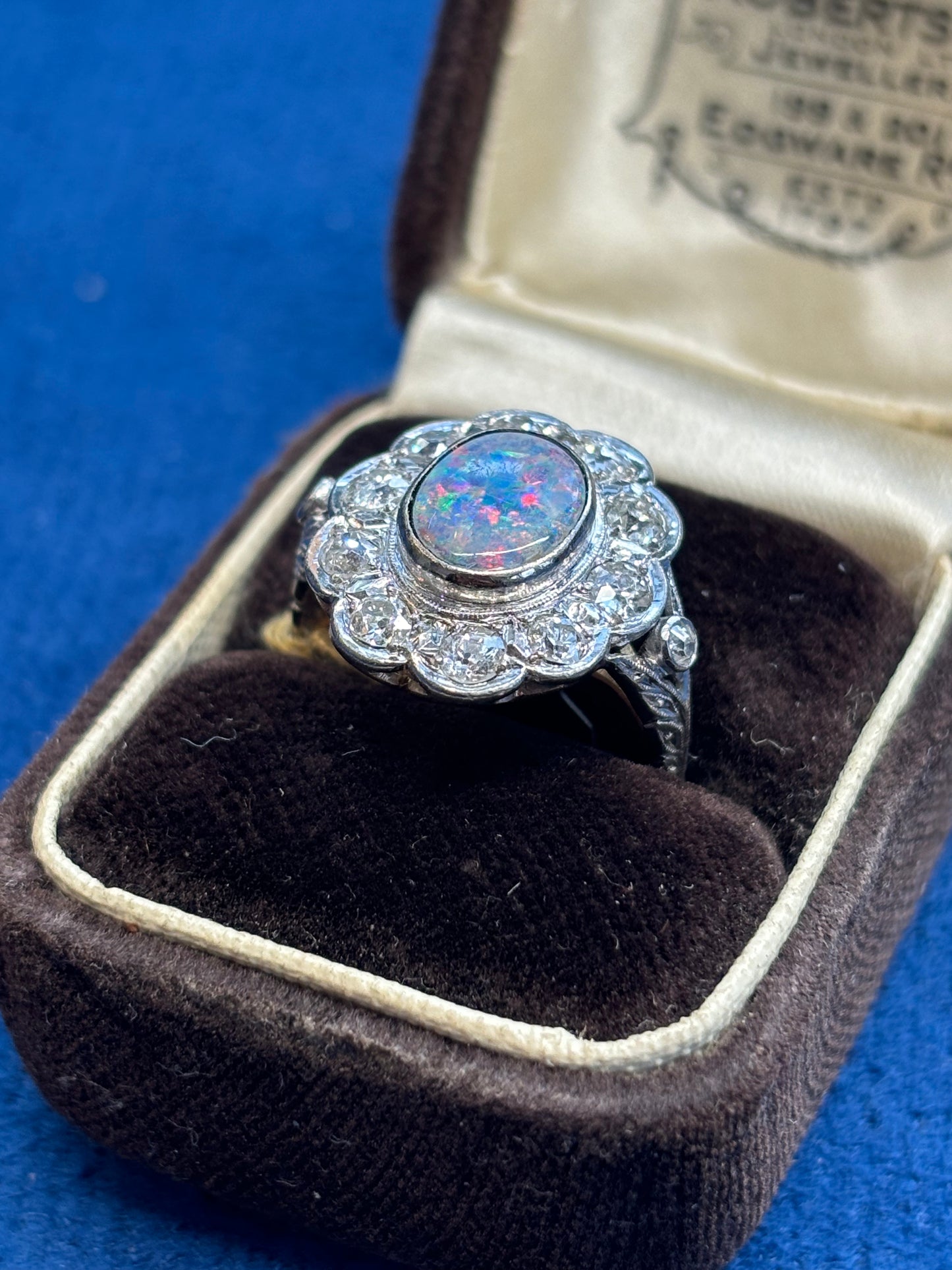 Opal and diamond 18ct and platinum ring