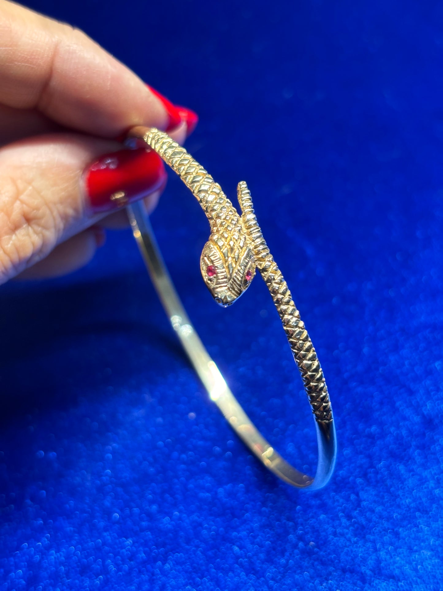 9ct gold serpent bangle with Ruby eyes