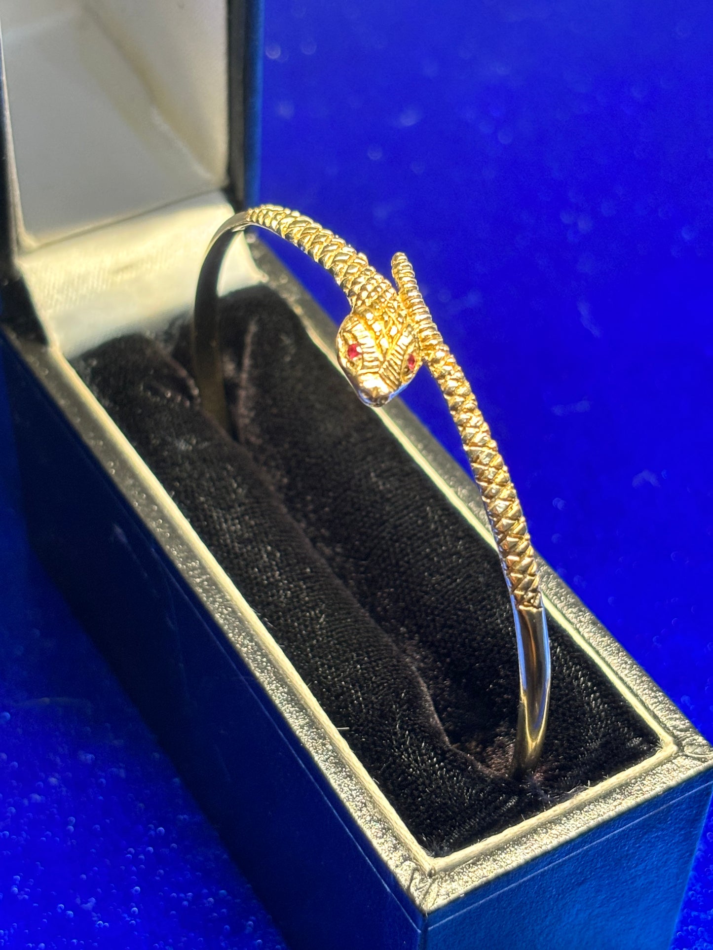 9ct gold serpent bangle with Ruby eyes