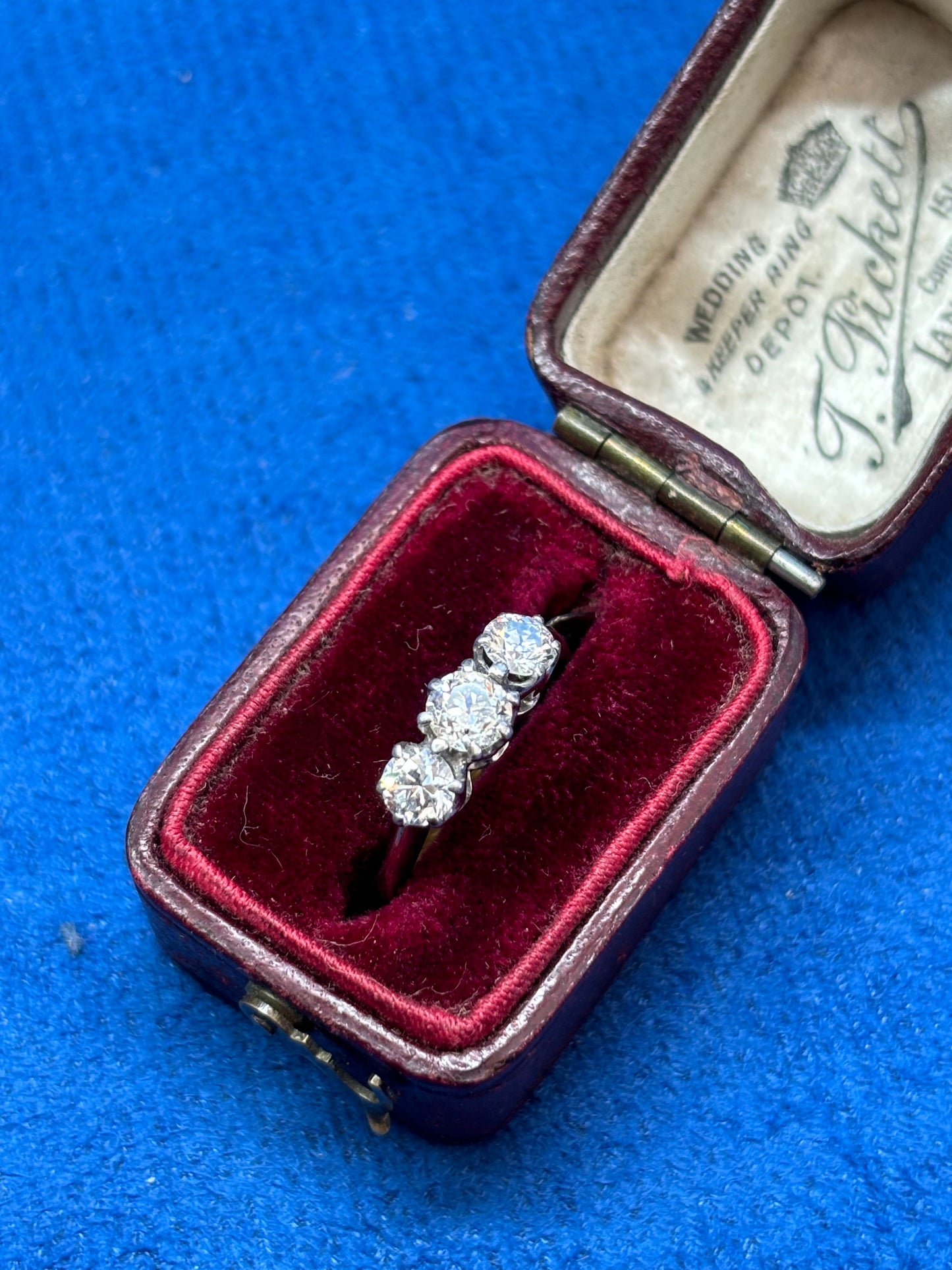 Diamond trilogy ring set in 18ct white gold