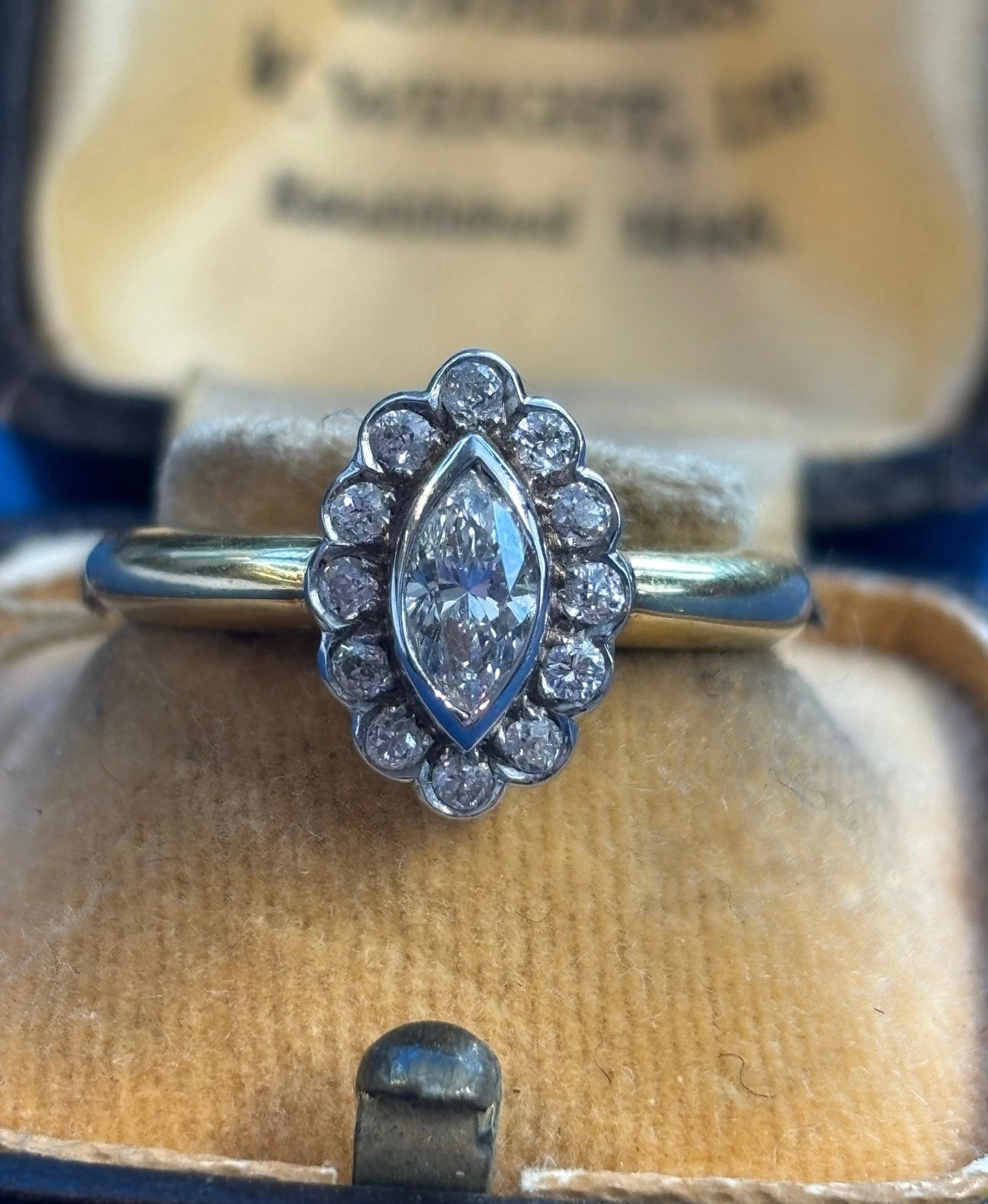 Marquise cut diamond cluster set in 18ct gold
