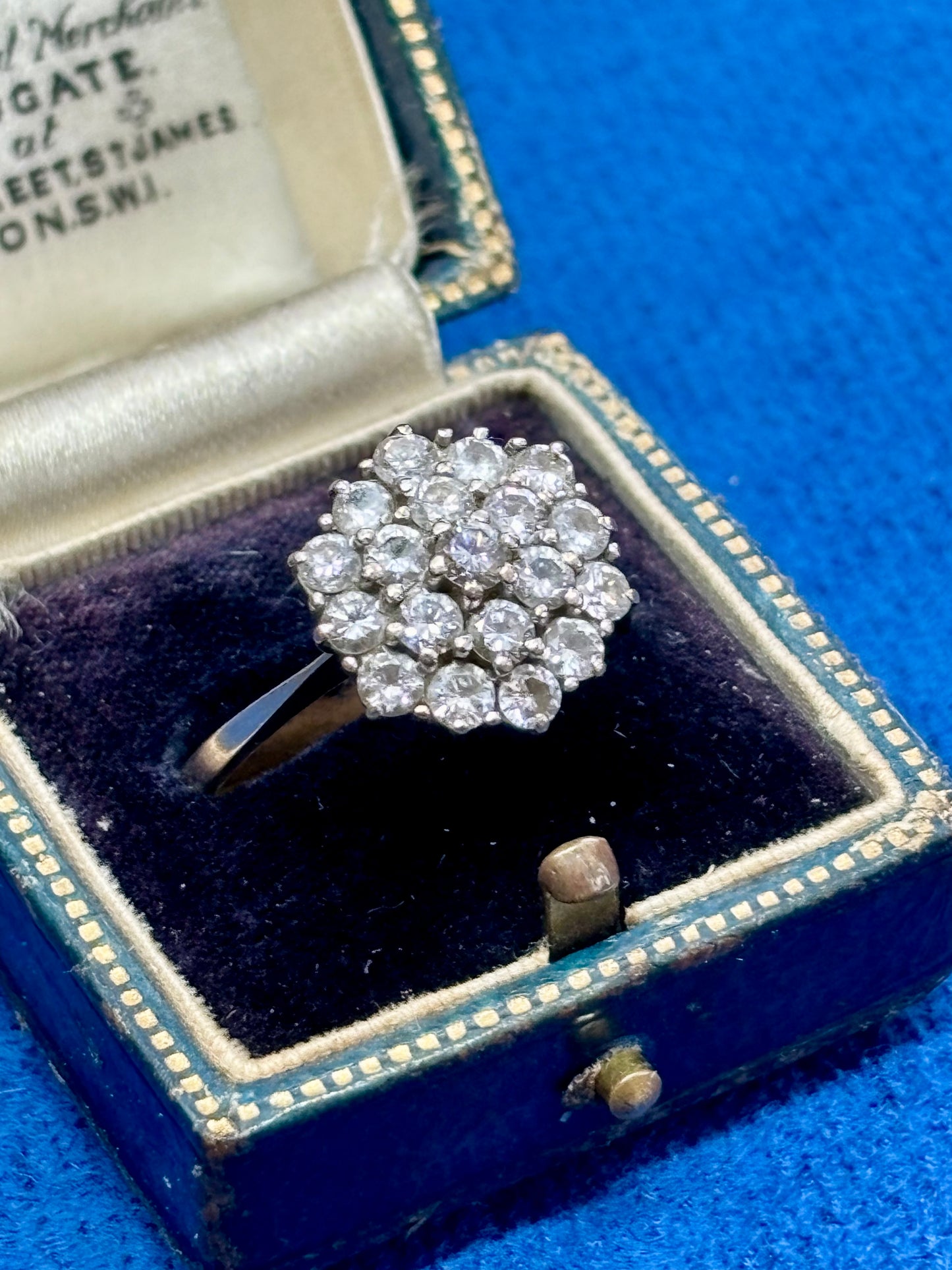 Vintage diamond cluster ring set in 18ct gold