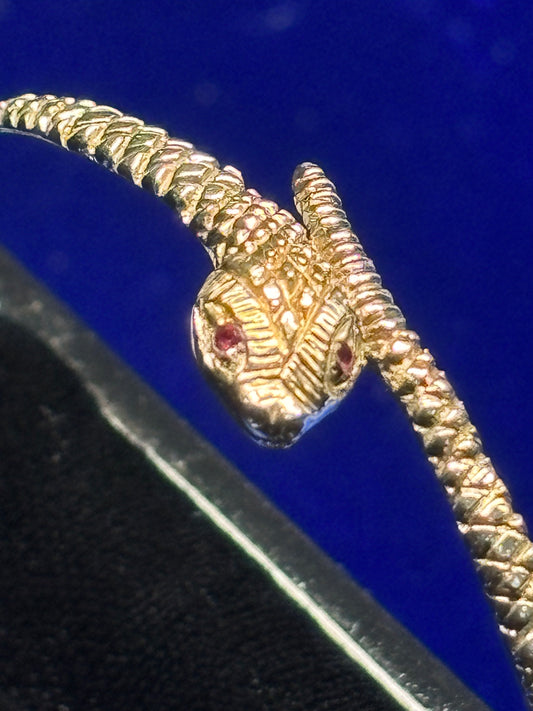 9ct gold serpent bangle with Ruby eyes