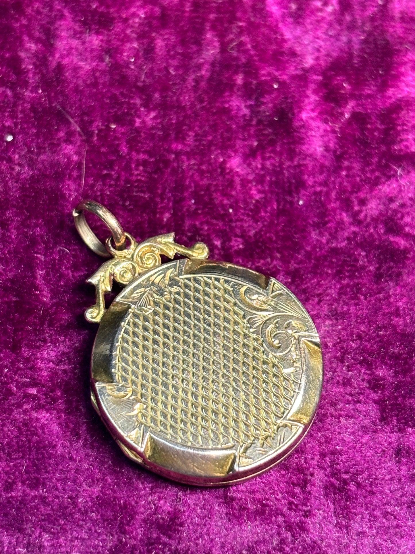 Antique locket with turned detailing