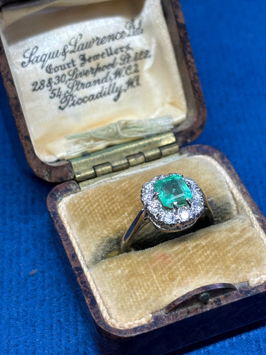 Cushion cut emerald and diamond ring