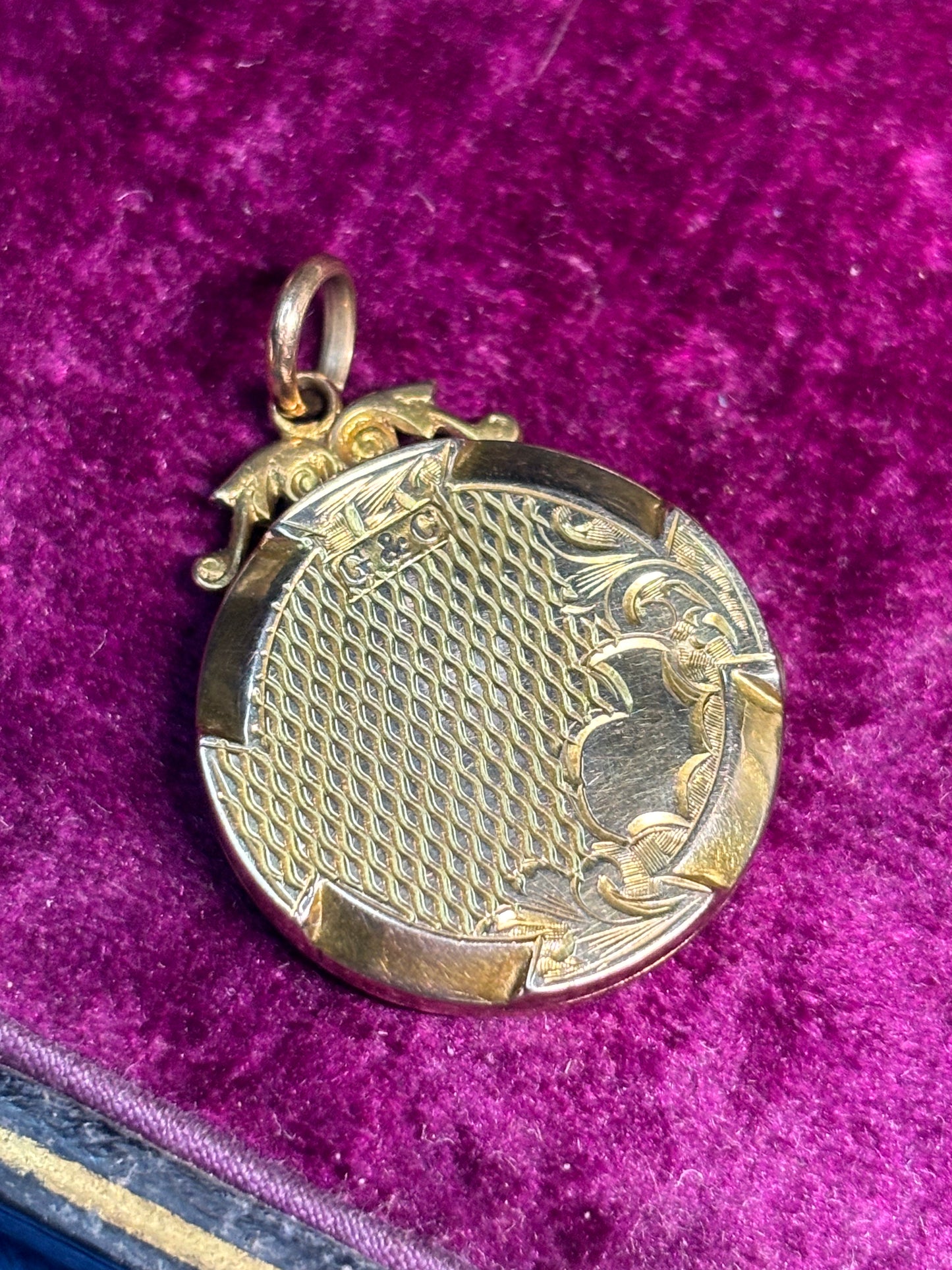 Antique locket with turned detailing