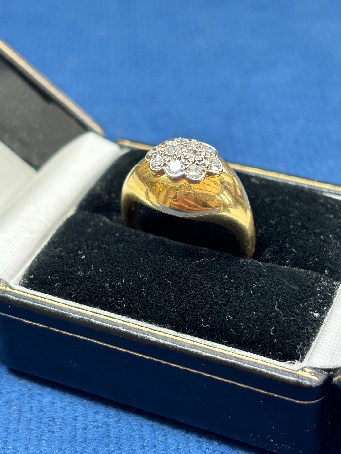 Diamond bombe ring set with diamonds and 18ct gold